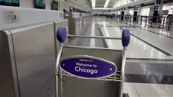 The usually busy Chicago O'Hare Airport has seen a sharp drop in passenger traffic because of the coronavirus pandemic. 